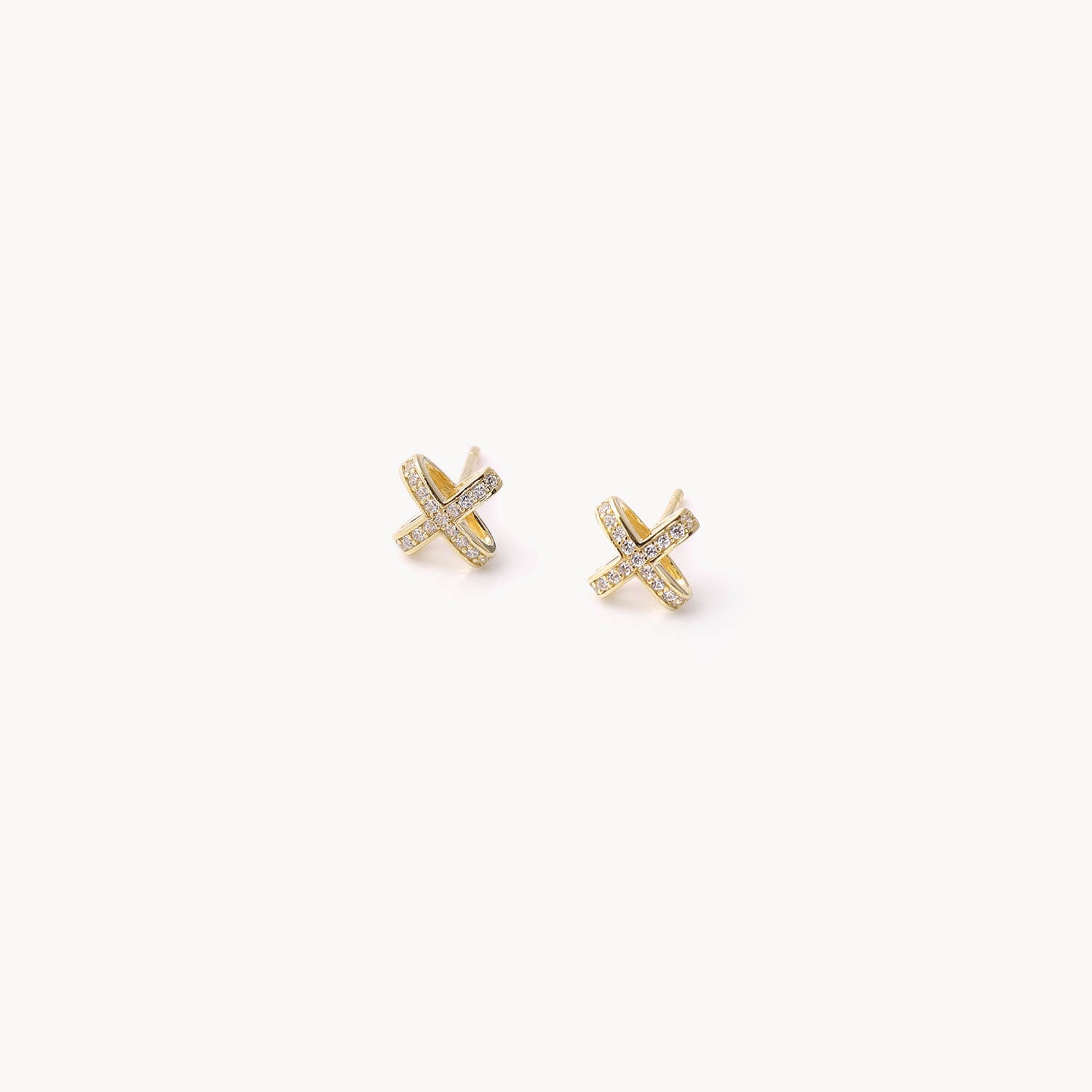 Hollow cross inlaid zirconium silver stud earrings